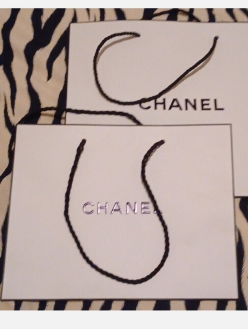 10 store paper bags from different retailers With Brand Logos
